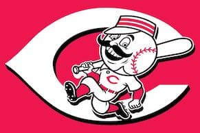 The cincinnati reds logo with a baseball player holding a bat.
