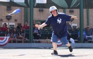 A man throwing a baseball at a baseball game.