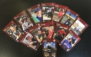 A group of baseball cards on a table.